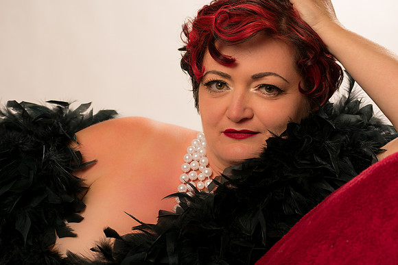 Wrapped in Black Feathers