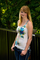 Thumbs in Her Pockets