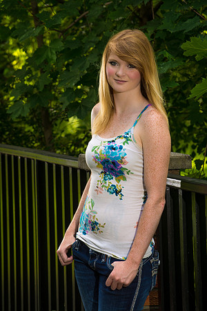 Thumbs in Her Pockets